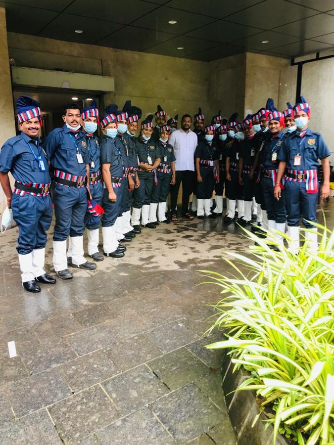 Industrial Security Force guards in ceremonial turnout standing in ranks