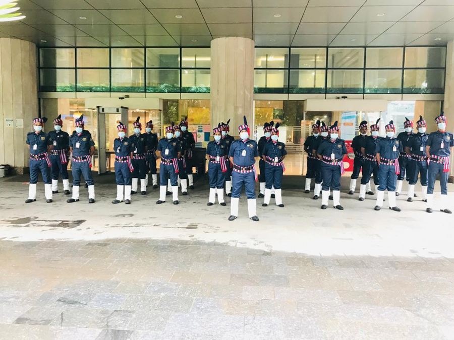 Industrial Security Force guards in formation at a client building entrance