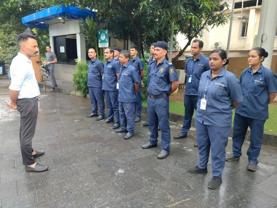 An area officer inspecting an Industrial Security Force shift